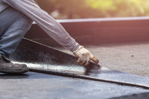 Professional Basement Waterproofing technician working in Dupont, IN